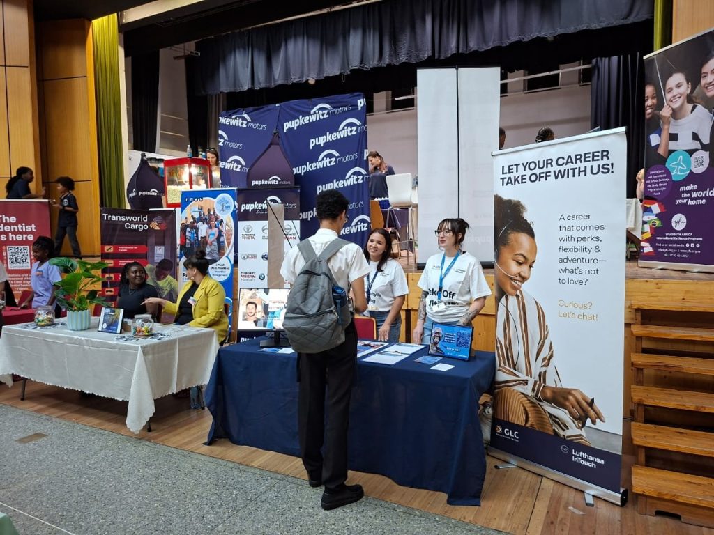 Global Load Control (GLC) team speaking with candidates at Career Fair Windhoek Namibia recruiting German speaking Customer Care Consultants